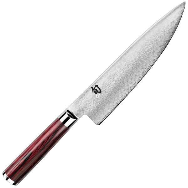 Das KAI Shun Kohen Anniversary - TBS-0220, weltweit limitiert auf 6.000 Stück, ist ein scharfes, hochwertiges Küchenmesser mit einer Klinge aus Damaszenerstahl mit ausgeprägtem Wellenmuster und japanischen Schriftzeichen in der Nähe des Kropfes. Mit seinem polierten, glatten Holzgriff in Dunkelrot mit schwarzen Akzenten ist dieses Meisterwerk wirklich außergewöhnlich.